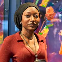 International Anchor Allies Winter 2026 First Mixer - a Navigator in a picture holding a laptop